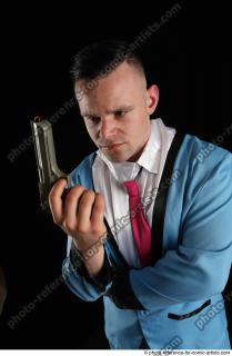 MIKAEL GOOD AGENT WITH GUN